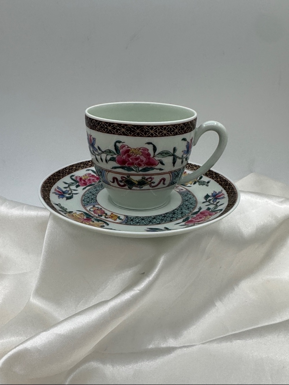 Haviland Limoges Kien Long demitasse cup and saucer set.